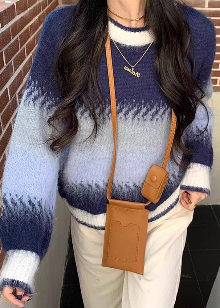 A Vintage Style Sweater with Delicate Timeless Details
