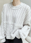 A Vintage Style Sweater with Delicate Timeless Details