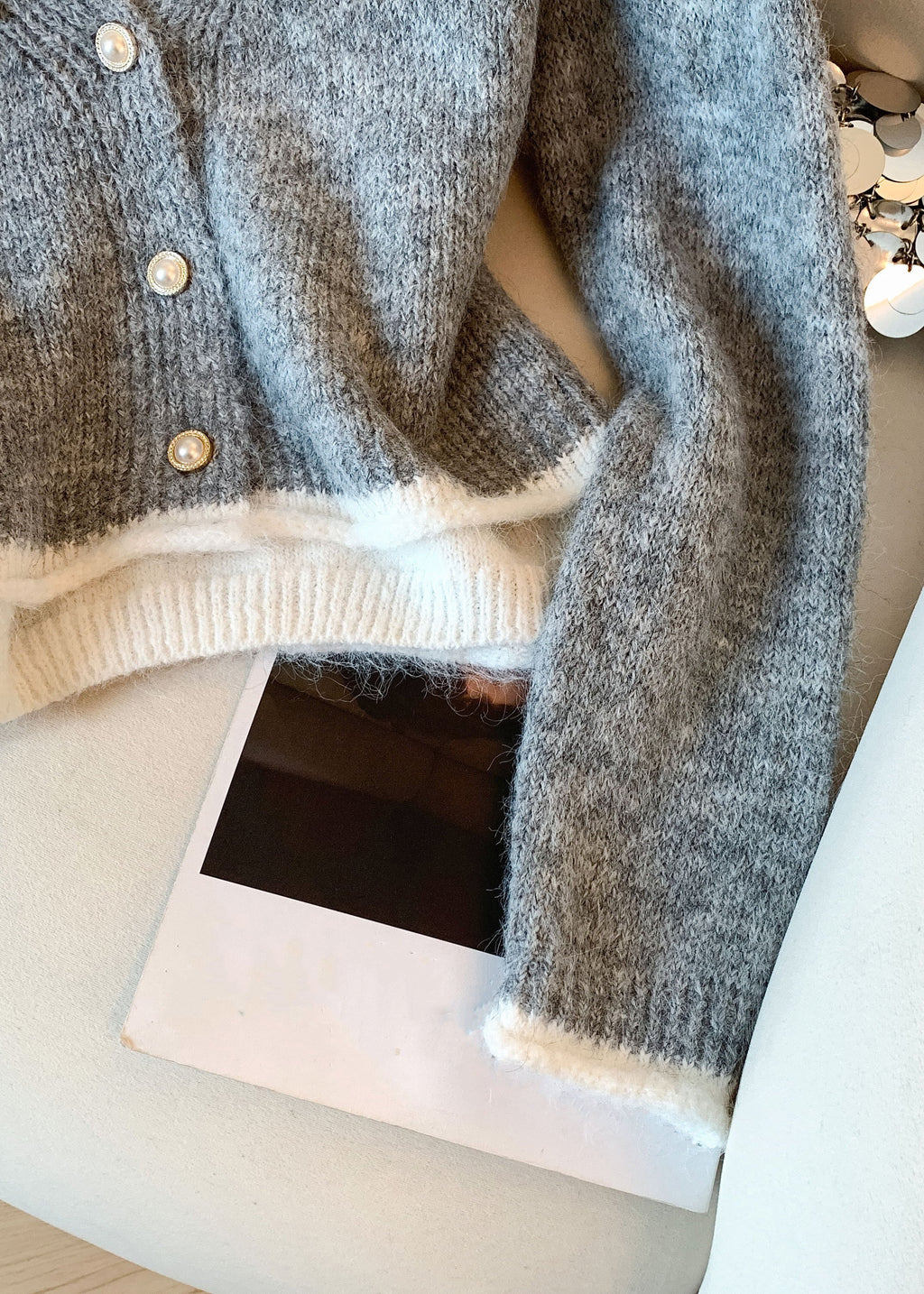 A Vintage Style Sweater with Delicate Timeless Details