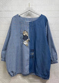 Well Tailored Top with a Graceful Silhouette