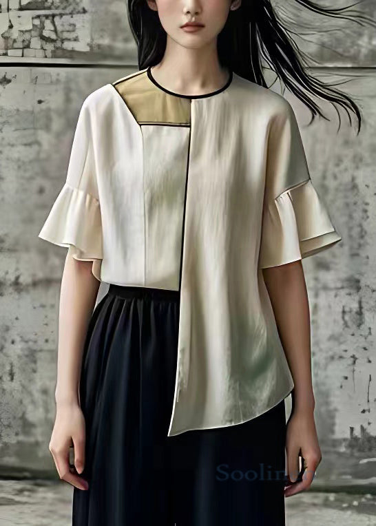 Well Tailored Top with a Graceful Silhouette