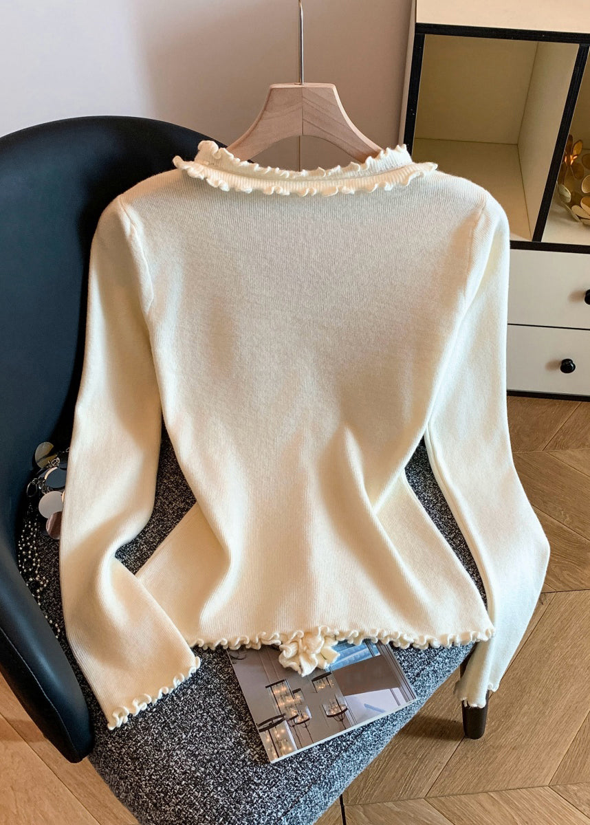 A Vintage Style Sweater with Delicate Timeless Details