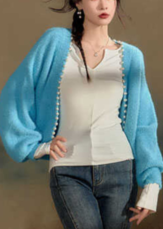 A Vintage Style Cardigan with Delicate Timeless Details