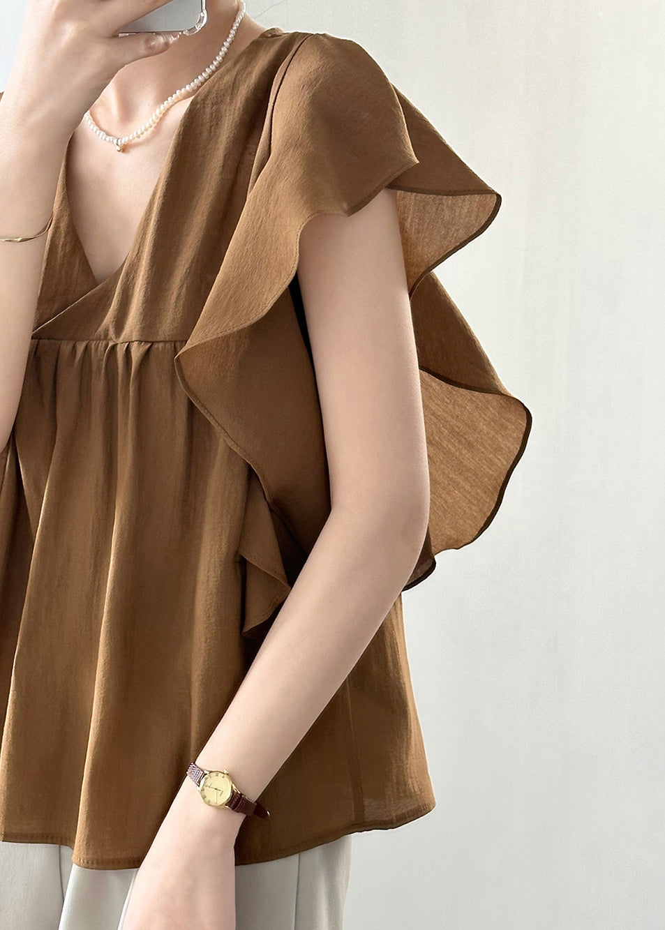 Well Tailored Top with a Graceful Silhouette