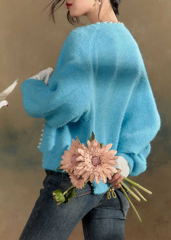 A Vintage Style Cardigan with Delicate Timeless Details