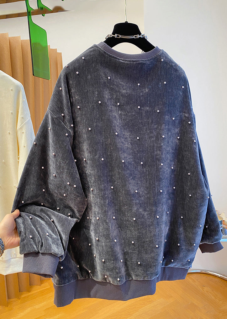A Vintage Style Pullover with Delicate Timeless Details
