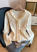 A Vintage Style Sweater with Delicate Timeless Details