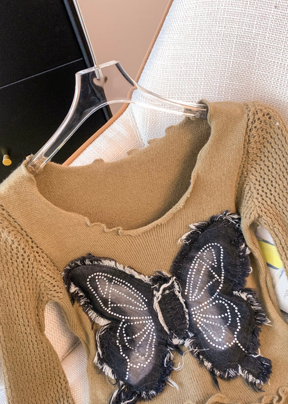 A Vintage Style Sweater with Delicate Timeless Details