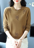 A Vintage Style Sweater with Delicate Timeless Details