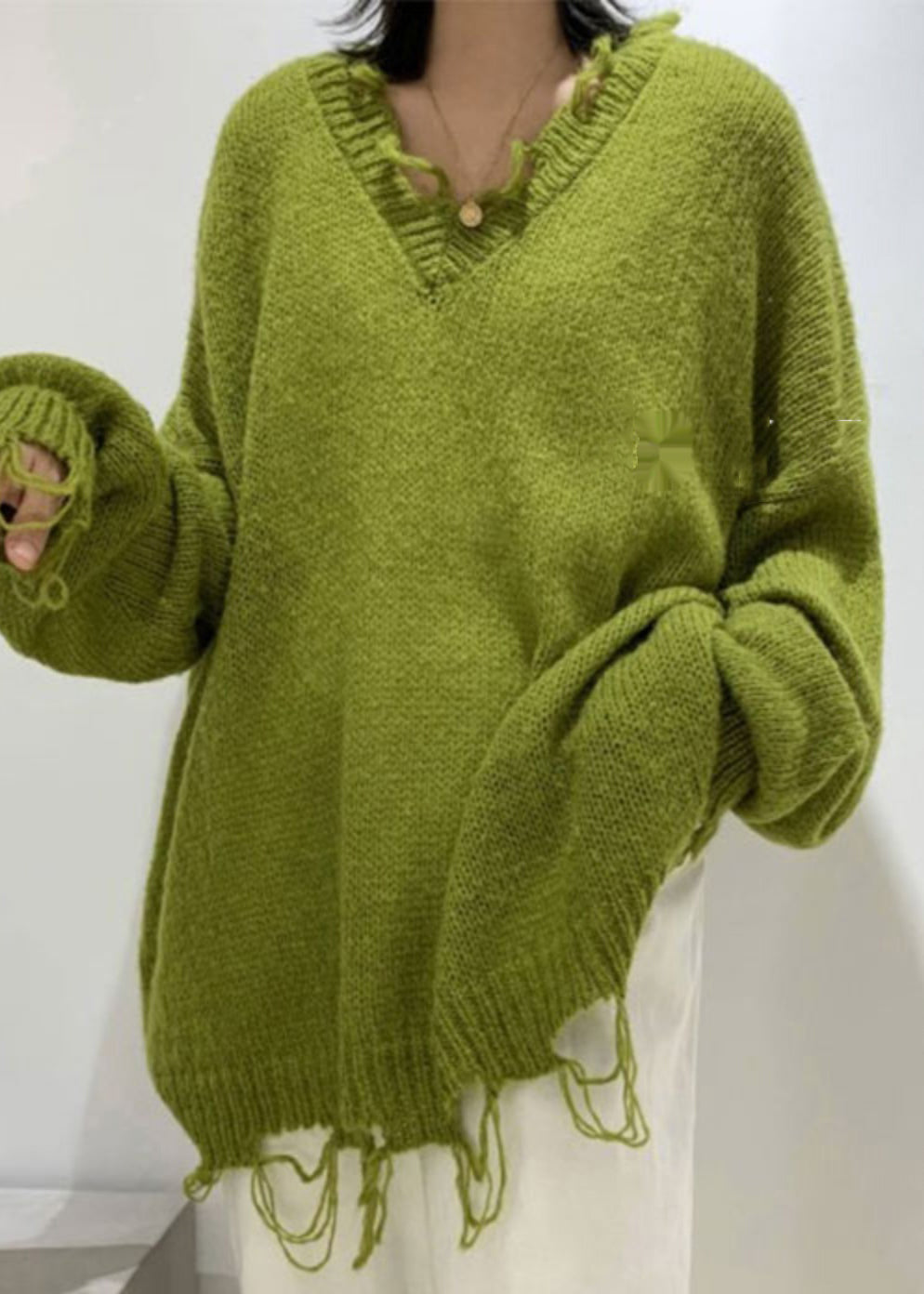 A Vintage Style Sweater with Delicate Timeless Details
