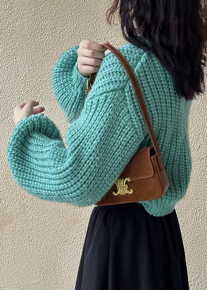 A Vintage Style Cardigan with Delicate Timeless Details