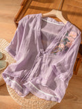 A Vintage Style Cardigan with Delicate Timeless Details
